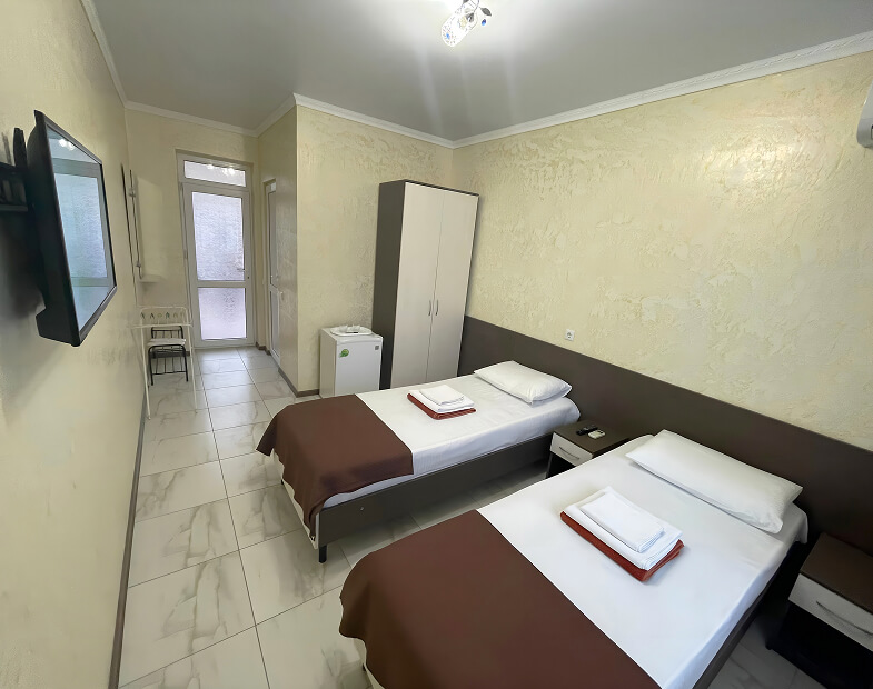 Фото номера Стандарт двухместный с двумя кроватями 2